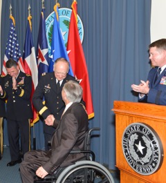 Brig. Gen. Flynn received his new badges of rank from both Governor Greg Abbott and his family