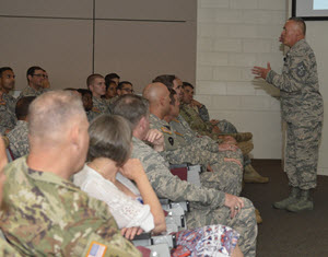 Photo By Sgt. Elizabeth Pena | Chief Master Sgt. Mitchell O. Brush, Senior Enlisted Advisor, right, talks with service members of the Texas Army and National Guard, left, during a town hall meeting at Camp Mabry, Austin, Texas, June 17, 2016. The meeting was part of the visit from General Frank J. Grass, Chief of the National Guard Bureau. Brush gave servicemembers words of advice on how to be good leaders for incoming soldiers and airmen. (U.S. Army National Guard photo by Sgt. Elizabeth Pena) 