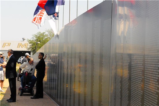 Texas Military Forces, civilian and military attendees of the American Heroes Air Show paid tribute to names on the American Veterans Traveling Vietnam War Memorial on Camp Mabry Saturday, April 16. 