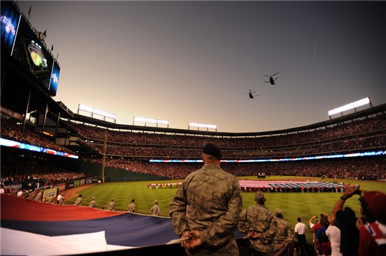 Two CH-47 Chinooks, belonging to the Texas Army National Guard, perform a two ship flyover during Game 4 of the Major League Baseball World Series between the St. Louis Cardinals and the Texas Rangers, Oct. 23, in Arlington, Texas. 