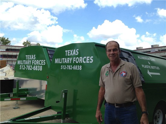 Kenneth Zunker stands in front of recycling trailers at the Texas Military Forces recycling facility on Camp Mabry in Austin, Texas. 