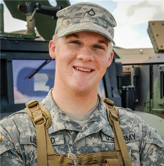 Pfc. Wil Ledford is credited with saving the life of his roommate after an accident in their apartment.