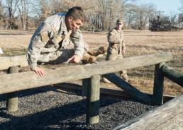 Senior Master Sgt. Elizabeth Gilbert Pfc. Marcial Ortiz, Chilean navy, competes in the obstacle course portion of the Texas Military Department's 2016 Best Warrior Competition at Camp Swift in Bastrop, Texas, Feb. 6, 2016. Traditionally a joint competition with competitors from the Texas Army and Air National Guards, this year's event invited service members from the U.S. Army Reserves component and the Chilean military to compete in the three-day grueling competition, testing the aptitude of each competitor in several mentally and physically challenging events relevant in today's operational environment. (U.S. Air National Guard photo by Senior Master Sgt. Elizabeth Gilbert/Released)