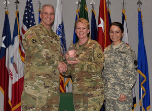 Courtesy Photo | Army Maj. Gen. Richard Gallant, Special Assistant to the Director of the Army National Guard, (left) presents Army Brig. Gen. Tracy Norris, Assistant Deputy Adjutant General of the Texas National Guard (center) and SFC Brenda Lopez, TXARNG G5 NCOIC (right), with the Army National Guard Communities of Excellence third place in the Bronze division at a ceremony held at the Army National Guard Readiness Center in Arlington, Virginia, May 23, 2016. (U.S. Army National Guard photo by Staff Sgt. Michelle Gonzalez)