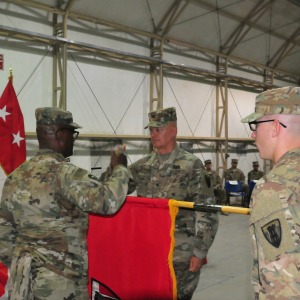 Courtesy Photo | Col. Charles Schoening, Commander of the 176th Engineer Brigade and Task Force Chaos and senior enlisted advisor Command Sgt. Maj. Anthony Simms, officially assumed authority for engineer construction missions for the entire U.S. Army Central area of responsibility. The occasion was marked with a formal ceremony attended by representatives from each subordinate command within the task force, as well as commanders of several adjacent units. (Photo by U.S. Army National Guard Courtesy of 176th Engineer Brigade)
