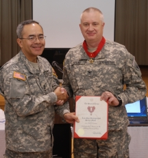 Lt. Gen. Charles Rodriguez, the Adjutant General of Texas presented Texas State Guard (TXSG) Colonel Frank Stead, Medical Brigade, with the Texas State Distinguished Service Medal in Brownsville, Texas, for his outstanding performance during the last year’s Operation Lone Star 07 (OLS). Photo by CPT . Michael Spraggins PAO TXSG