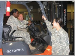 TXSG personnel engaged in forklift operations supporting recovery from the effects of Hurricane Dolly in Welasco, Texas.Photo by CPT Michael Spaggins, JMTF Public Affairs Officer