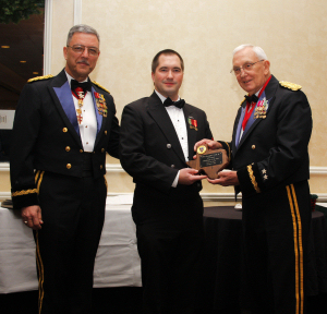 Photo of NCO of the Year Award being presented