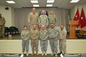 Members of the TXSG OCS Command Staff and Instructor Cadre. Photo Credit: Capt. Shawn James. Top Row (left to right): LT Keith Przybyla, CPT H. Lee Burton, Capt. Christopher Click Bottom Row (left to right): CPT JoAnna Carle, MGySgt(MC) Nichols, COL Thomas Hamilton, MSgt Raymond Winkler, Sgt Patrick Rodriguez