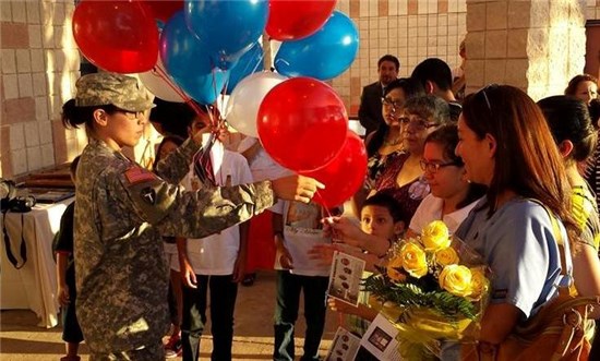 Soldiers and family members of the 436th Chemical Company, Texas Army National Guard, released 1,000 balloons in honor of five of their fallen soldiers during a ceremony held at the National Guard armory in Laredo, Texas,
