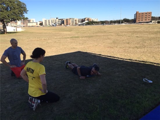 SGT Cook and SGT De la Garza, Master Fitness Trainers, saw us and came to our rescue to give us guidance on proper form for pushups and sit-ups.