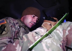 Spc. Thomas Leroux writes in his logbook Dec. 21, 2019 in Rio Grande City, Texas. Mobile Video Surveillance System teams keep a log of their findings while on duty. MVSS truck team leaders keep a log of their activities throughout their shift. (Air National Guard photo by Staff Sgt. De’Jon Williams)