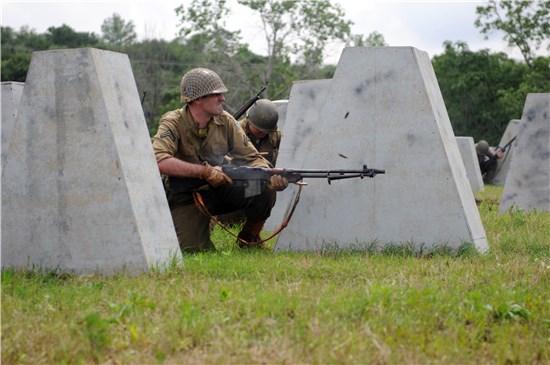 Period actors reenact a World War II battle at the 2010 American Heroes Celebration