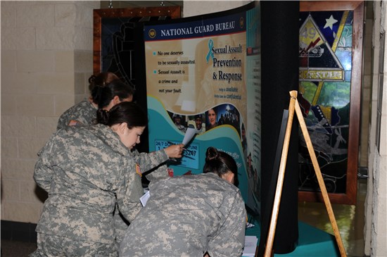 Maj. Gen. John F. Nichols, Texas' adjutant general, signing a proclamation recognizing April as Sexual Assault Awareness Month for the Texas Military Forces, at Camp Mabry, in Austin, Texas, April 3, 2012.