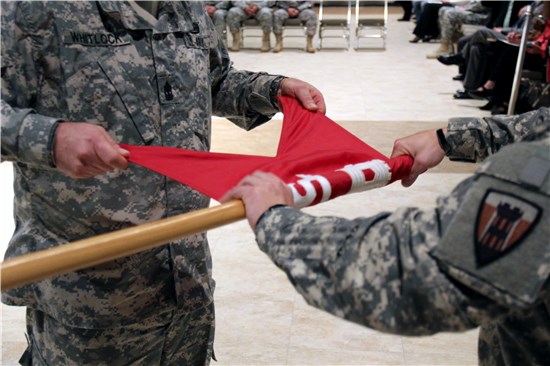The 454th Engineer Company colors are cased during a mobilization ceremony at the McNease Convention Center in San Angelo, Texas, Feb. 19, 2014.