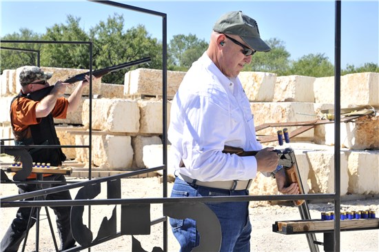 In this image released by Joint Task Force 136 (Maneuver Enhancement Brigade), Col. Lee Schnell (left) and Brig. Gen. Patrick Hamilton (right) participate in the 2014 Sporting Clays Classic at the Texas Disposal Systems Exotic Game Ranch in Buda, Texas, Oct. 16, 2014. The annual event hosts teams of military veterans competing in clay shooting and raises money for the Boy Scouts of America. (Photo by Master Sgt. Daniel Griego)
