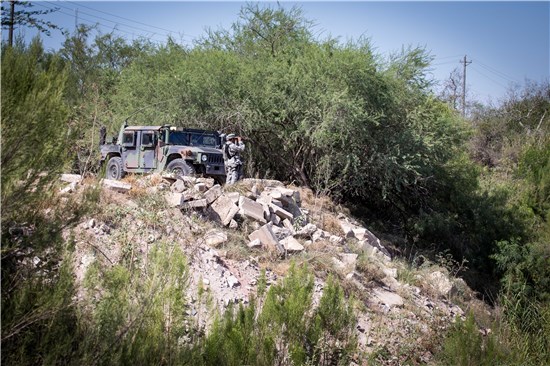 Airmen from the Texas Air National Guard observe a section of the Rio Grande River. The airmen are serving at the Texas-Mexico border in support of Operation Strong Safety