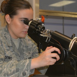 U.S. Air Force Senior Airman Alexandra Denio, 136th Medical Group, Texas Air National Guard, medical technician, checks the current prescription on a patients classes during the Greater Chenango Cares Innovative Readiness Training mission in Norwich, N.Y., July 20, 2016. The mission is a 10-day real world training exercise, providing medical, dental, optometry, and veterinary services at no cost the community. (U.S. Air National Guard photo by Staff Sgt. Kristina Overton)