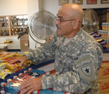 Sgt. Eliberto R. Cavazos, the Texas State Guard and also a resident of Raymondville, Texas help distribute water and snacks to hurricane Dolly victims and volunteers at the local high school that was used as a point of distribution site Jul. 25.Photo by Texas Military Forces by First Sgt. Lek Mateo, Standing Joint Interagency Task Force