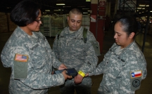 Texas Army National Guard and Texas State Guard soldiers training together on the SNITS system Special Needs Evacuation Tracking System.