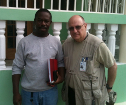Chaplain Fair with Mayor of Fort Liberte, Haiti on a civilian mission. Chaplain/Major Fair sometimes puts on different hats, he is also a Major and Chaplin with the Texas State Guard.
