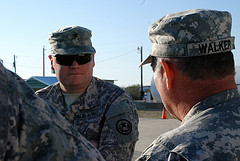 Brig. Gen. William L. Smith, Director Joint Staff and Commander, Domestic Operations for Joint Force Headquarters of Texas, receives a briefing from 2nd Lt. Steve Walker of the Texas State Guard 3rd Battalion, 1st Regiment at the Oral Rabies Vaccination Program command post in Zapata, Texas on January 6, 2012. A cooperative effort between the Texas Department of State Health Services, the U.S. Department of Agriculture, the Texas National Guard and other local, state and federal agencies in an effort to eradicate and prevent reintroduction of the rabies virus, goals for 2012 include dropping more than 450,000 baits in South Texas during the 16 day mission. (U.S. Army photo by Laura L. Lopez).